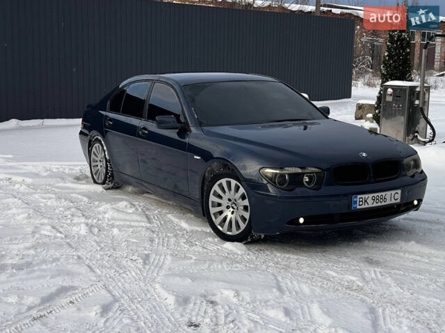 Синій БМВ 7 Серія, об'ємом двигуна 2.99 л та пробігом 420 тис. км за 7300 $, фото 1 на Automoto.ua