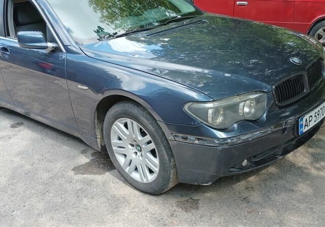 Синій БМВ 7 Серія, об'ємом двигуна 3 л та пробігом 300 тис. км за 800 $, фото 1 на Automoto.ua