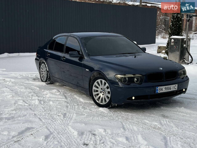 Синій БМВ 7 Серія, об'ємом двигуна 2.99 л та пробігом 420 тис. км за 7300 $, фото 1 на Automoto.ua