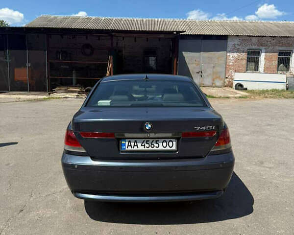 Синій БМВ 7 Серія, об'ємом двигуна 4.4 л та пробігом 333 тис. км за 3700 $, фото 1 на Automoto.ua