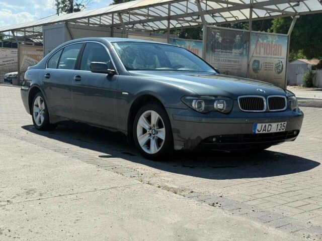 Синий БМВ 7 Серия, объемом двигателя 3 л и пробегом 300 тыс. км за 3300 $, фото 1 на Automoto.ua