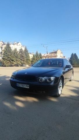 Синий БМВ 7 Серия, объемом двигателя 4.4 л и пробегом 500 тыс. км за 7500 $, фото 1 на Automoto.ua