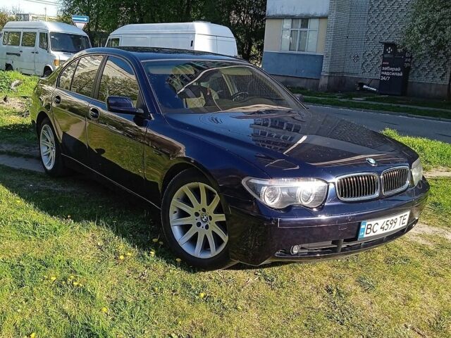 Синій БМВ 7 Серія, об'ємом двигуна 2.99 л та пробігом 507 тис. км за 6700 $, фото 1 на Automoto.ua
