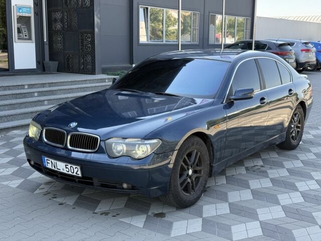 Синий БМВ 7 Серия, объемом двигателя 3 л и пробегом 300 тыс. км за 2948 $, фото 1 на Automoto.ua