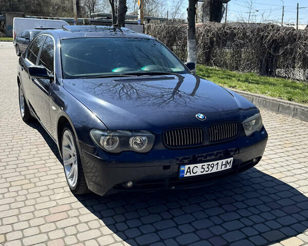 Синий БМВ 7 Серия, объемом двигателя 3 л и пробегом 490 тыс. км за 5490 $, фото 1 на Automoto.ua