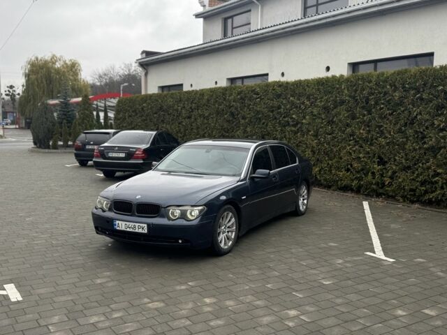 Синий БМВ 7 Серия, объемом двигателя 3.6 л и пробегом 240 тыс. км за 3299 $, фото 1 на Automoto.ua