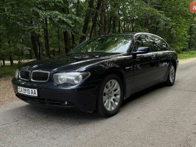 Синий БМВ 7 Серия, объемом двигателя 6 л и пробегом 280 тыс. км за 9999 $, фото 1 на Automoto.ua