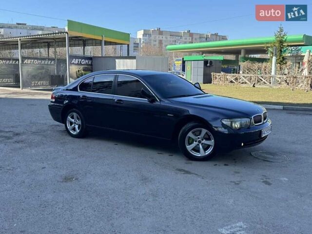 Синий БМВ 7 Серия, объемом двигателя 3 л и пробегом 283 тыс. км за 7400 $, фото 1 на Automoto.ua