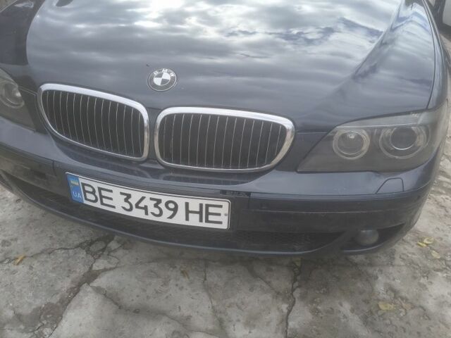 Синий БМВ 7 Серия, объемом двигателя 3 л и пробегом 270 тыс. км за 6000 $, фото 1 на Automoto.ua