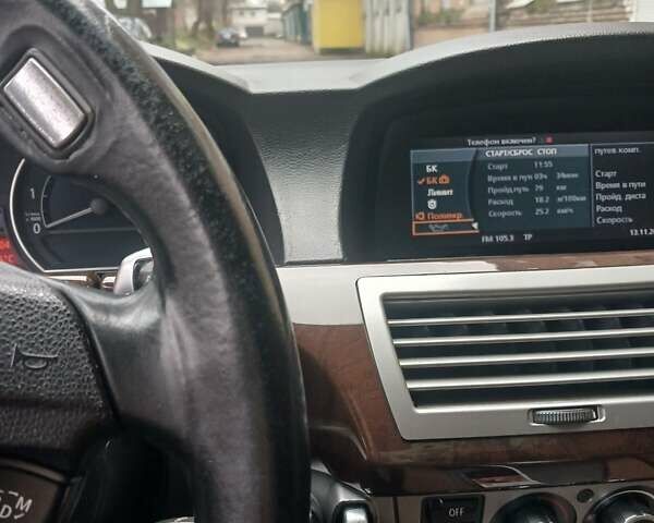 Синий БМВ 7 Серия, объемом двигателя 4 л и пробегом 306 тыс. км за 12000 $, фото 1 на Automoto.ua