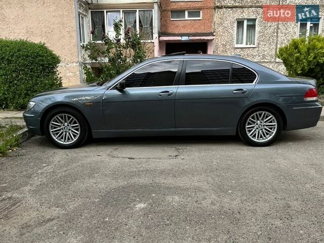 Синий БМВ 7 Серия, объемом двигателя 3 л и пробегом 271 тыс. км за 7800 $, фото 1 на Automoto.ua
