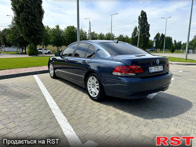 Синий БМВ 7 Серия, объемом двигателя 3 л и пробегом 220 тыс. км за 7900 $, фото 1 на Automoto.ua
