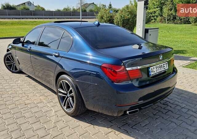 Синий БМВ 7 Серия, объемом двигателя 2.98 л и пробегом 177 тыс. км за 14500 $, фото 1 на Automoto.ua