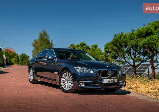 Синій БМВ 7 Серія, об'ємом двигуна 3 л та пробігом 171 тис. км за 25100 $, фото 1 на Automoto.ua