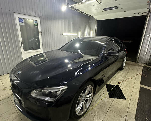 Синий БМВ 7 Серия, объемом двигателя 4.39 л и пробегом 153 тыс. км за 15400 $, фото 1 на Automoto.ua