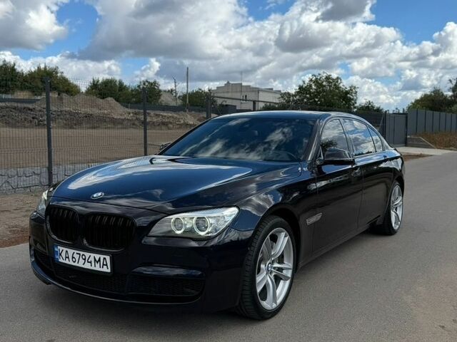 Синій БМВ 7 Серія, об'ємом двигуна 2.98 л та пробігом 260 тис. км за 16800 $, фото 1 на Automoto.ua