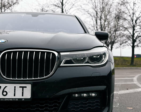 Синий БМВ 7 Серия, объемом двигателя 2.99 л и пробегом 189 тыс. км за 32500 $, фото 1 на Automoto.ua