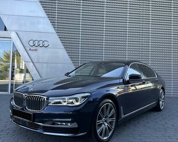 Синий БМВ 7 Серия, объемом двигателя 2.99 л и пробегом 105 тыс. км за 58000 $, фото 1 на Automoto.ua