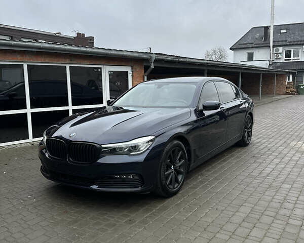 Синій БМВ 7 Серія, об'ємом двигуна 3 л та пробігом 190 тис. км за 23300 $, фото 1 на Automoto.ua