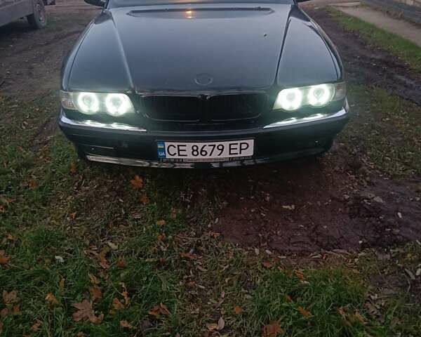 Зеленый БМВ 7 Серия, объемом двигателя 5.4 л и пробегом 517 тыс. км за 8000 $, фото 1 на Automoto.ua
