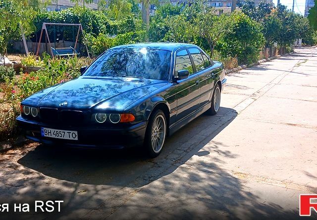 Зеленый БМВ 7 Серия, объемом двигателя 3.5 л и пробегом 380 тыс. км за 4300 $, фото 1 на Automoto.ua