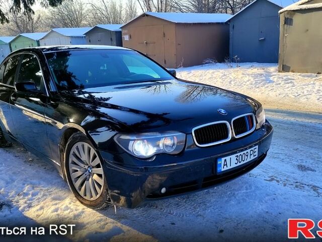 Черный БМВ 730, объемом двигателя 3 л и пробегом 430 тыс. км за 7000 $, фото 1 на Automoto.ua