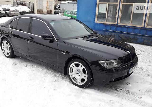 Чорний БМВ 730, об'ємом двигуна 3 л та пробігом 400 тис. км за 15000 $, фото 1 на Automoto.ua