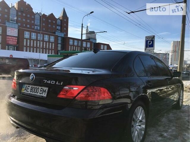 Чорний БМВ 740, об'ємом двигуна 4 л та пробігом 170 тис. км за 16900 $, фото 1 на Automoto.ua