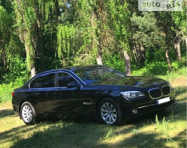 Чорний БМВ 740, об'ємом двигуна 3 л та пробігом 116 тис. км за 23800 $, фото 1 на Automoto.ua