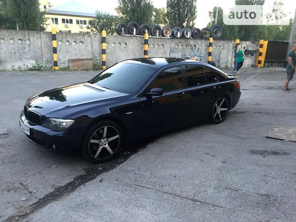 Синий БМВ 740, объемом двигателя 4 л и пробегом 200 тыс. км за 15300 $, фото 1 на Automoto.ua