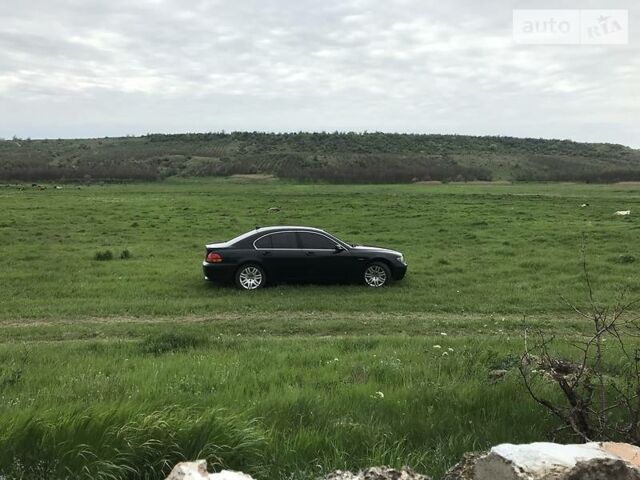 Чорний БМВ 745, об'ємом двигуна 4.5 л та пробігом 282 тис. км за 8500 $, фото 1 на Automoto.ua