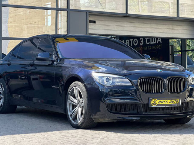 Черный БМВ 750, объемом двигателя 4.4 л и пробегом 350 тыс. км за 15990 $, фото 1 на Automoto.ua