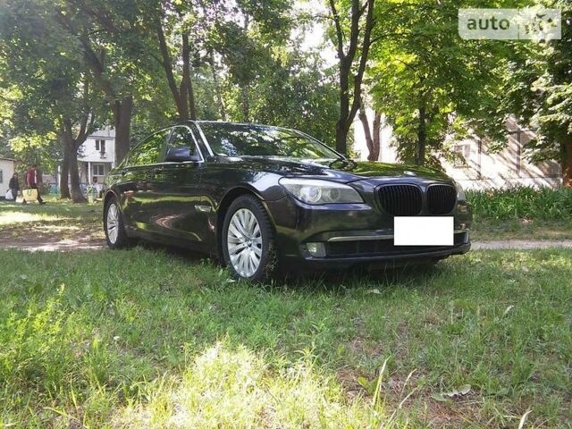 Синий БМВ 760, объемом двигателя 6 л и пробегом 134 тыс. км за 33000 $, фото 1 на Automoto.ua