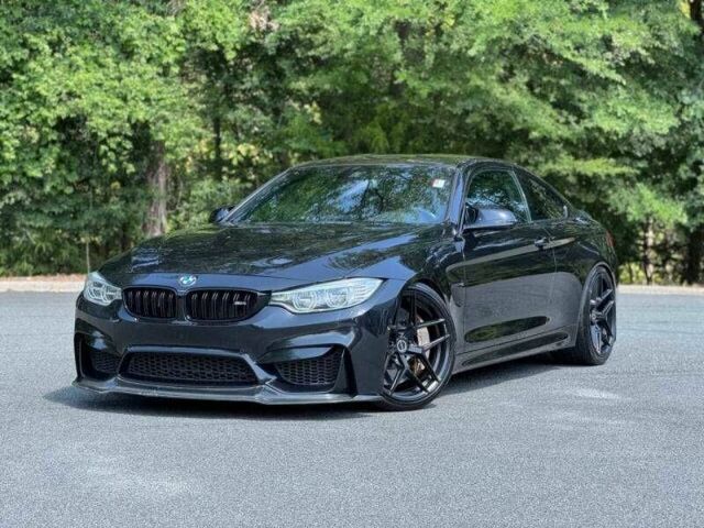 Черный БМВ M4, объемом двигателя 3 л и пробегом 48 тыс. км за 13400 $, фото 1 на Automoto.ua