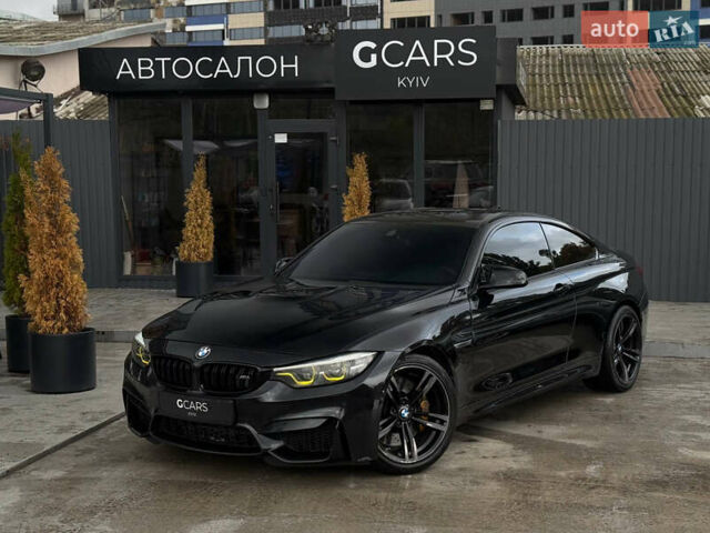 Черный БМВ M4, объемом двигателя 2.98 л и пробегом 140 тыс. км за 26900 $, фото 1 на Automoto.ua