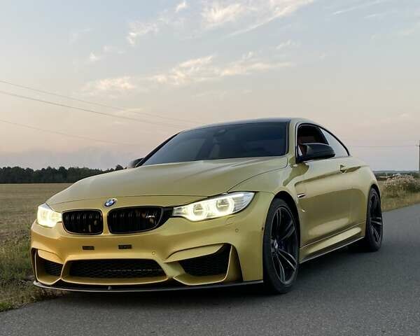 Желтый БМВ M4, объемом двигателя 2.98 л и пробегом 105 тыс. км за 44900 $, фото 1 на Automoto.ua