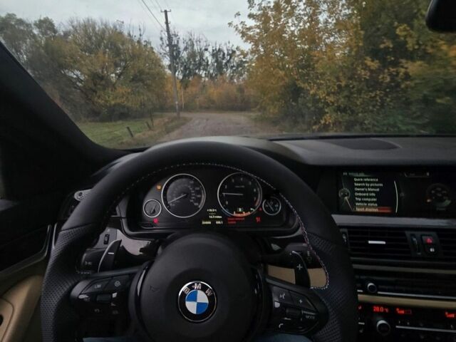 Чорний БМВ М5, об'ємом двигуна 2 л та пробігом 255 тис. км за 14021 $, фото 1 на Automoto.ua