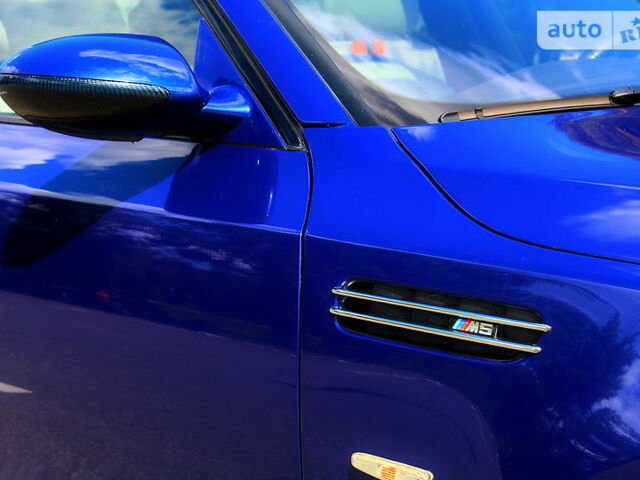 Синий БМВ М5, объемом двигателя 5 л и пробегом 89 тыс. км за 37777 $, фото 1 на Automoto.ua