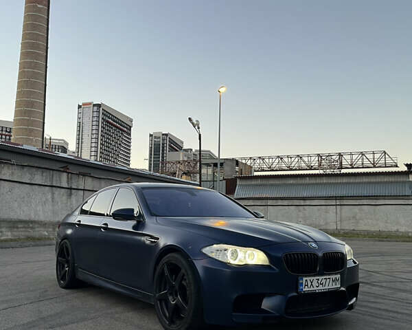 Синій БМВ М5, об'ємом двигуна 4.4 л та пробігом 75 тис. км за 28700 $, фото 1 на Automoto.ua