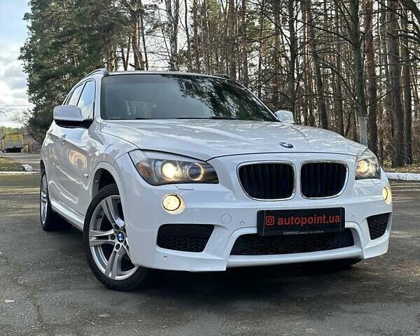 Білий БМВ Х1, об'ємом двигуна 2 л та пробігом 232 тис. км за 12750 $, фото 1 на Automoto.ua