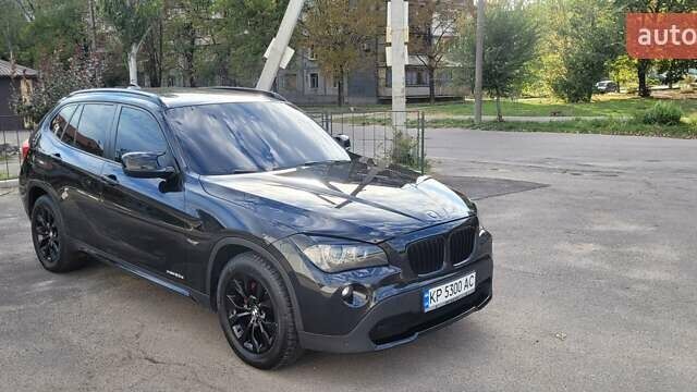 Чорний БМВ Х1, об'ємом двигуна 2 л та пробігом 215 тис. км за 13500 $, фото 1 на Automoto.ua