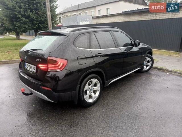 Черный БМВ Х1, объемом двигателя 2 л и пробегом 306 тыс. км за 12500 $, фото 1 на Automoto.ua