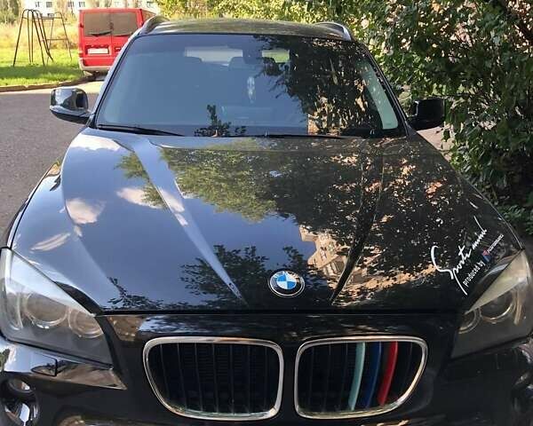 Чорний БМВ Х1, об'ємом двигуна 2 л та пробігом 220 тис. км за 10500 $, фото 1 на Automoto.ua