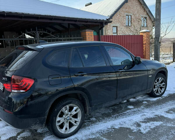 Чорний БМВ Х1, об'ємом двигуна 2 л та пробігом 138 тис. км за 11000 $, фото 1 на Automoto.ua