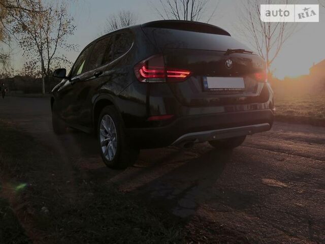 Чорний БМВ Х1, об'ємом двигуна 2 л та пробігом 70 тис. км за 19000 $, фото 1 на Automoto.ua