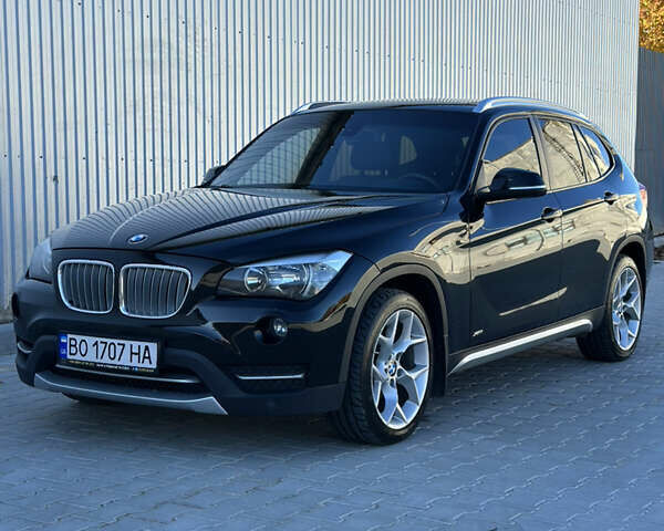 Черный БМВ Х1, объемом двигателя 2 л и пробегом 240 тыс. км за 14200 $, фото 1 на Automoto.ua