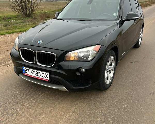 Черный БМВ Х1, объемом двигателя 2 л и пробегом 127 тыс. км за 11000 $, фото 1 на Automoto.ua
