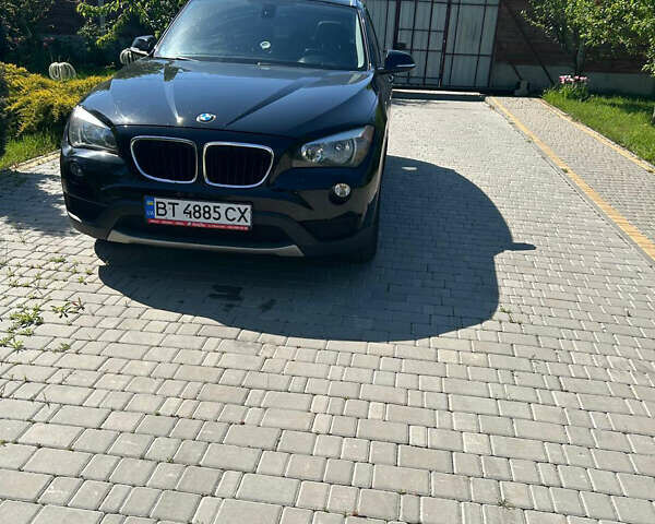 Чорний БМВ Х1, об'ємом двигуна 2 л та пробігом 122 тис. км за 12999 $, фото 1 на Automoto.ua