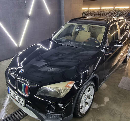 Черный БМВ Х1, объемом двигателя 2 л и пробегом 94 тыс. км за 12500 $, фото 1 на Automoto.ua