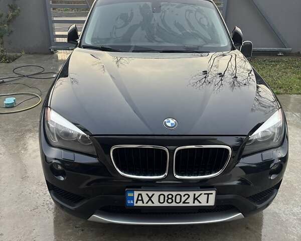 Чорний БМВ Х1, об'ємом двигуна 2 л та пробігом 155 тис. км за 12200 $, фото 1 на Automoto.ua
